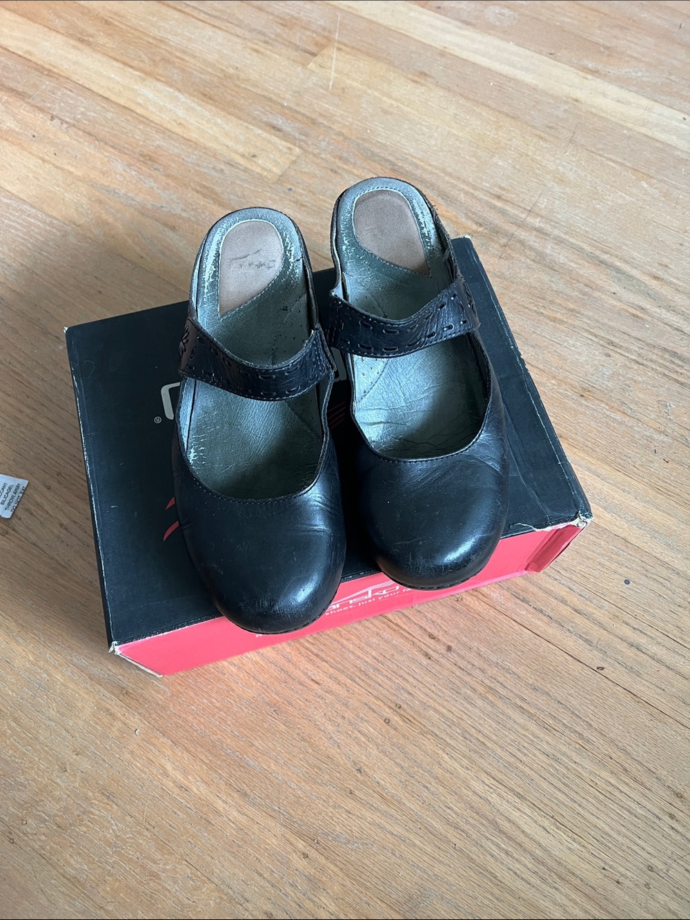 Dansko solitaire black clogs.